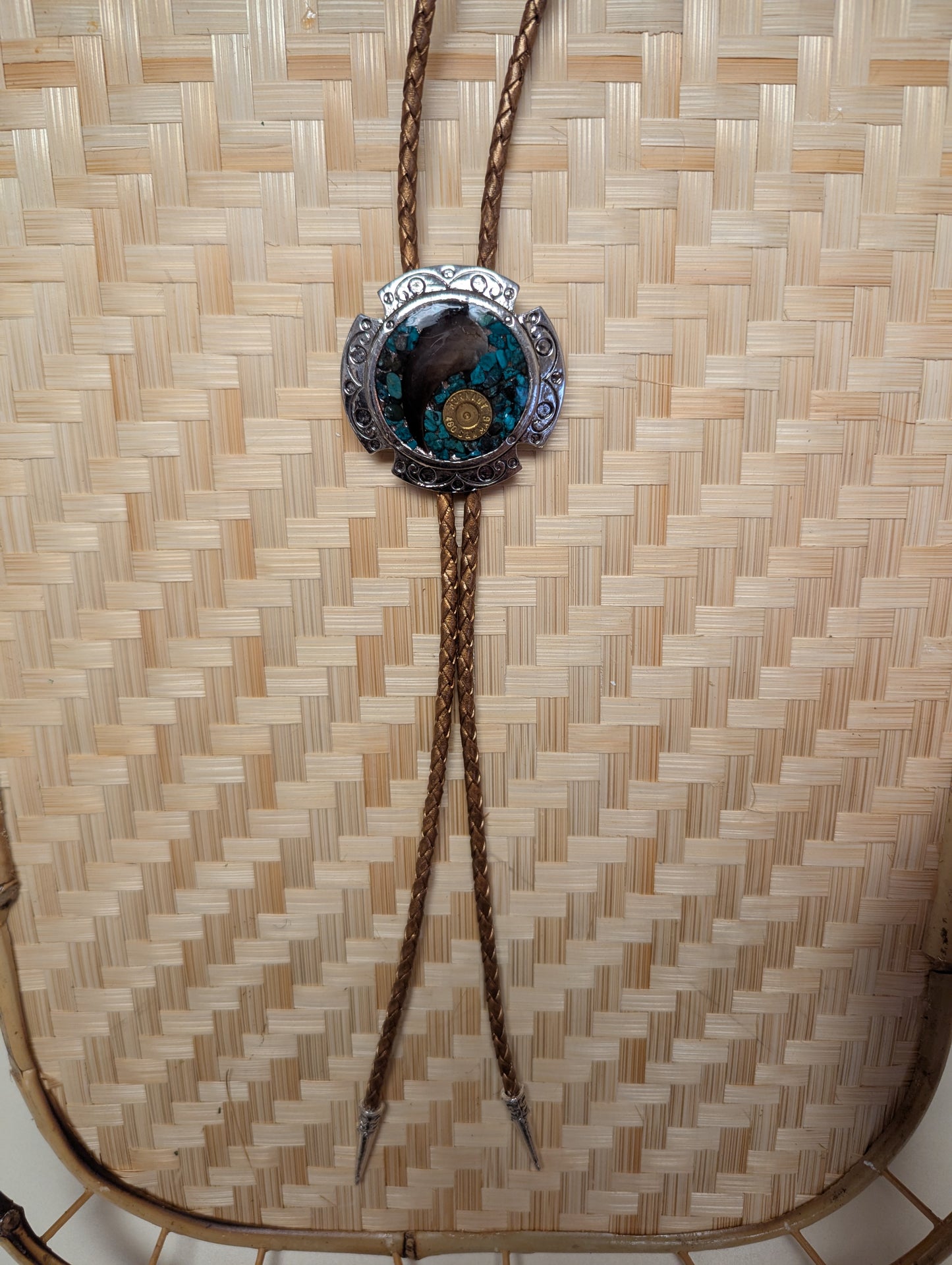 BadAssBabe Badass Bolo Tie with a detailed decorative clasp and leather cord, stylish western accessory for men and women.