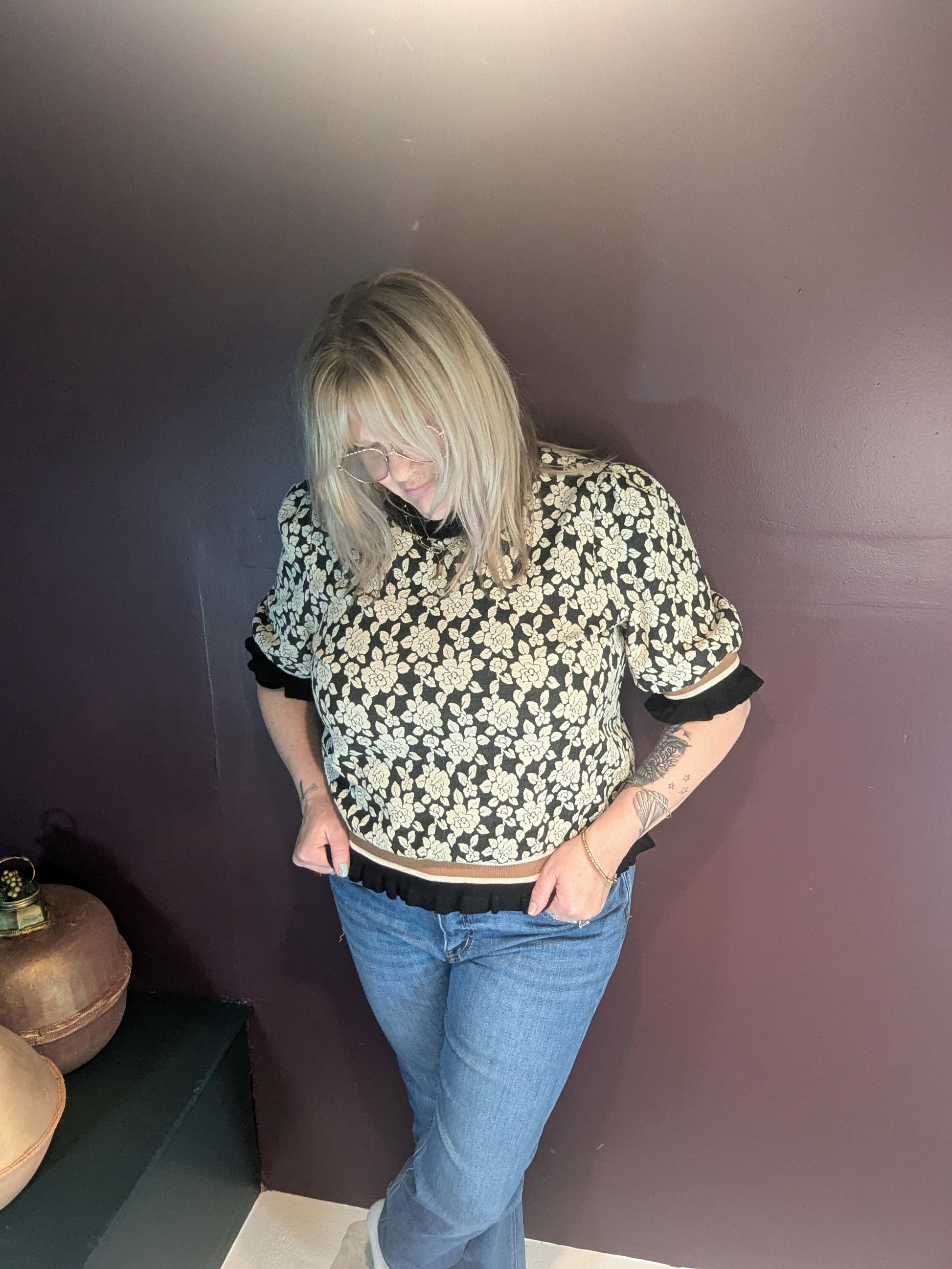 BiBi A Rose is a Rose sweater featuring a soft knit fabric with a floral rose pattern, long sleeves, and a cozy fit.