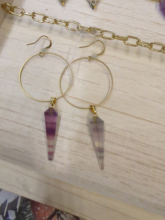 Fluorite prism and prehnite gemstone hoop earrings by Skipping Stones Jewelry, featuring large silver hoops with colorful gemstone accents.