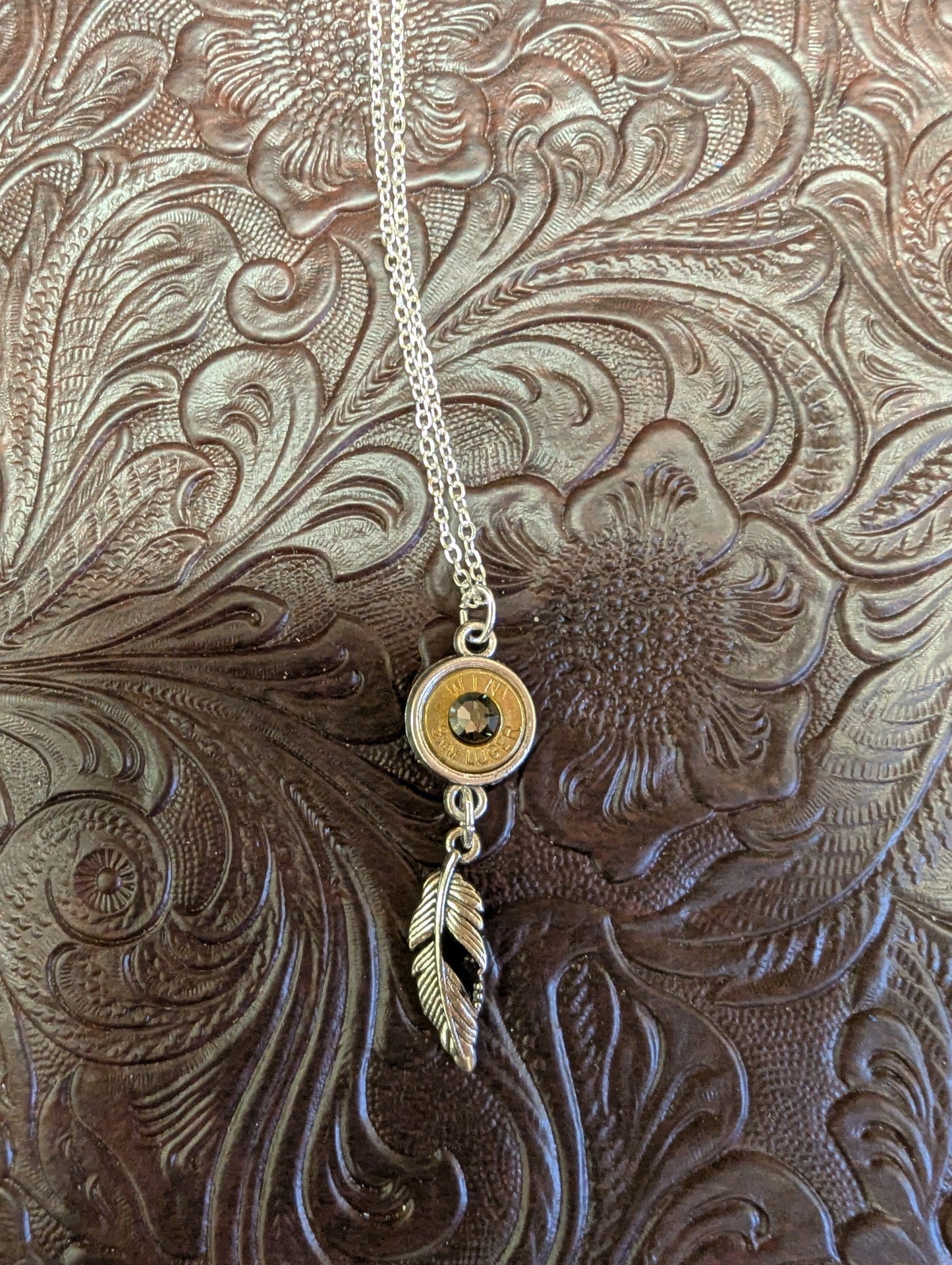 BadAssBabe Caliber Bezel Necklace with Dangle, featuring a sleek chain and a stylish bezel pendant with dangling detail.