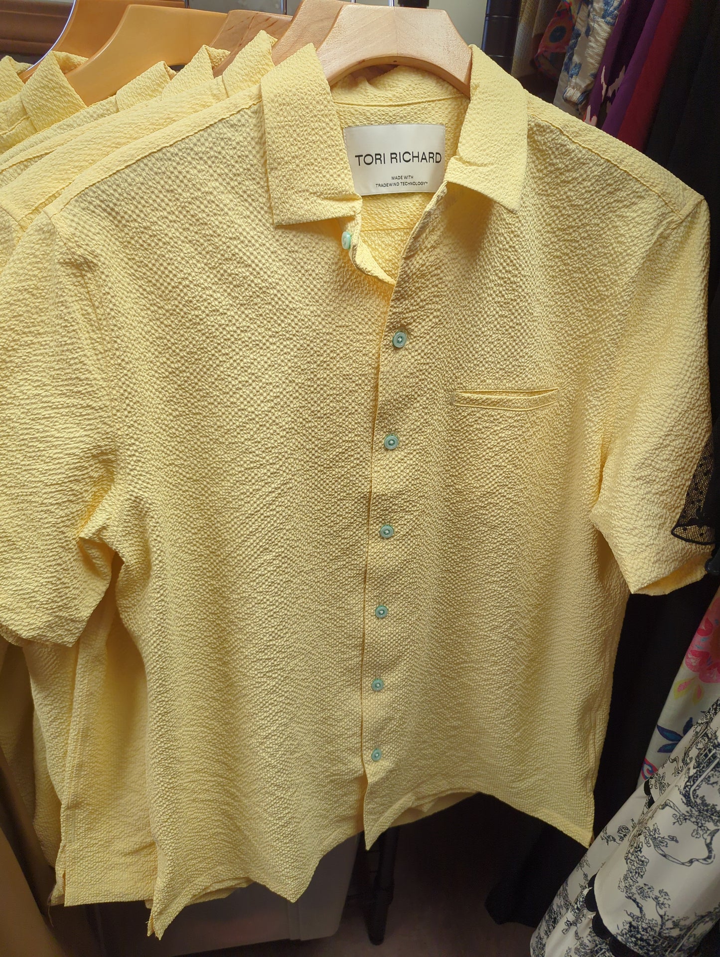 Men's Tori Richards Lanai Dress Shirt in lightweight fabric with a classic collar and patterned design, displayed on a hanger.