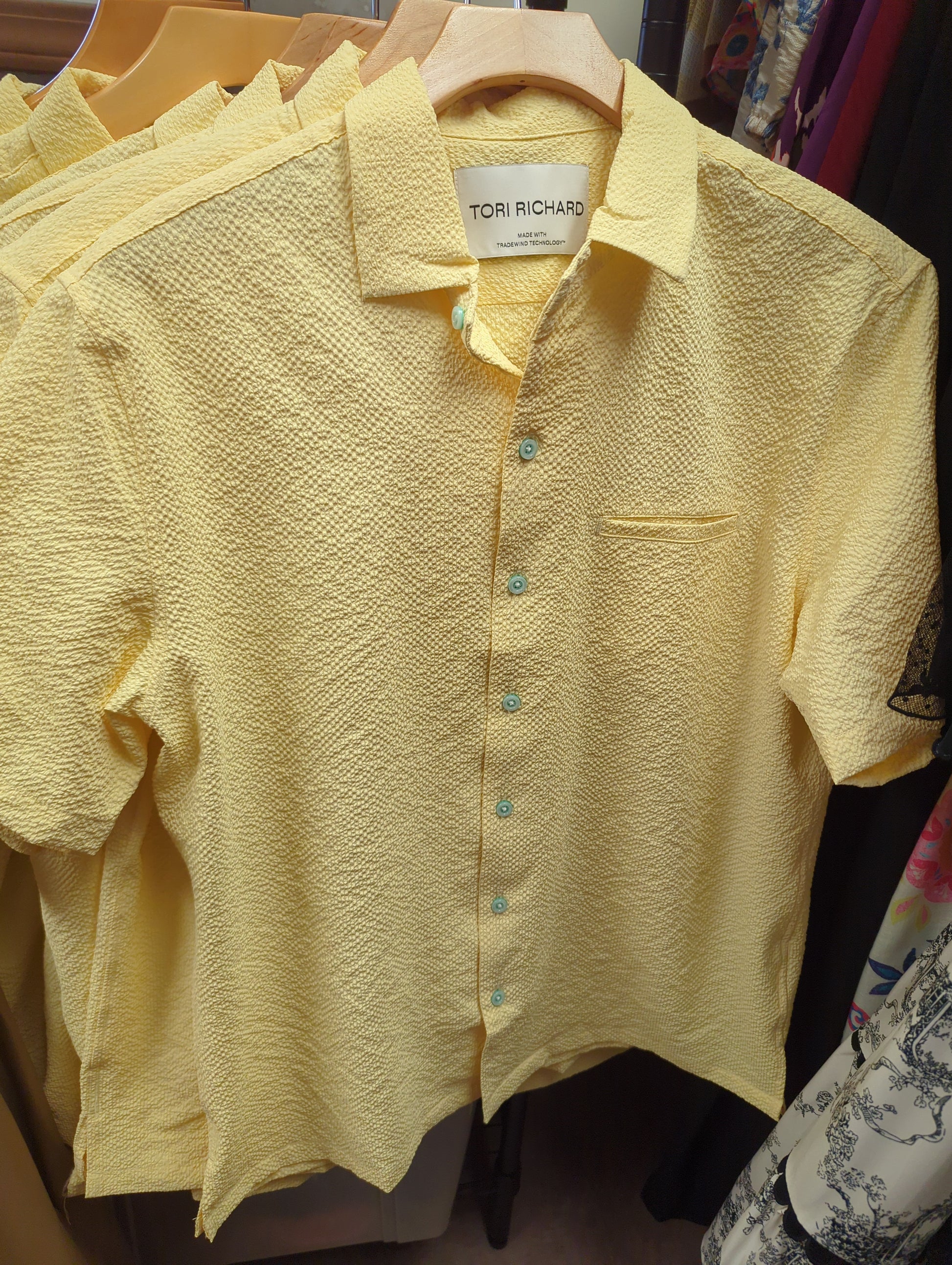 Men's Tori Richards Lanai Dress Shirt in lightweight fabric with a classic collar and patterned design, displayed on a hanger.
