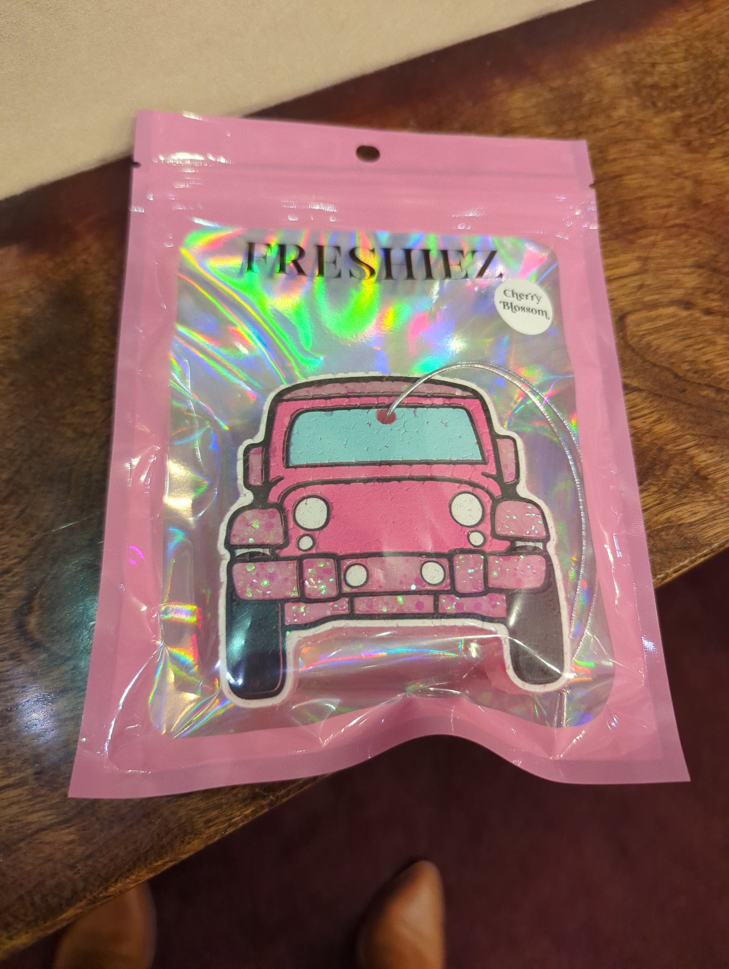 Simply Southern airfreshener with floral design, featuring fresh scent and decorative accents for home or car use.